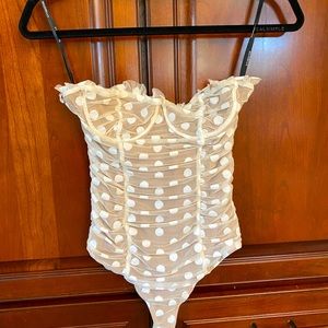 Strapless white polka dot bodysuit